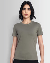 Model wearing Dcyphr's Women Essentials Stretch Brand Tee (Mud)